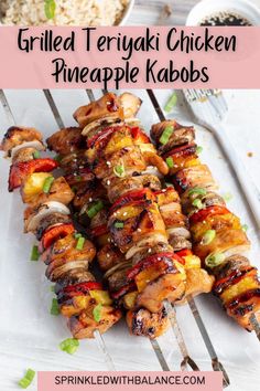 grilled teriyaki chicken pineapple kabobs on skewers with rice in the background