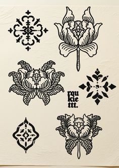 four different designs on a white wall