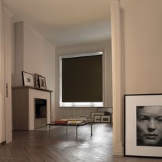 a living room filled with furniture and a fire place next to a wall mounted tv