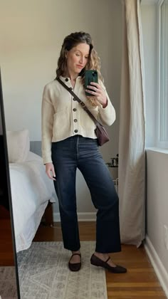 Minimal mom-friendly outfit idea for spring with a cropped cream colored cardigan, black jeans, and mary jane ballet flats Humid Summer Outfit, Creme Outfits, How To Style Mary Janes, Mary Jane Flats Outfit, Intentional Wardrobe, Outfits With Mary Janes, Mary Jane Outfit, Mary Janes Outfit, Mary Jane Shoes Outfit