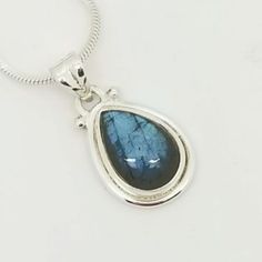 Rich Blue Labradorite Teardrop Pendant Set In A Sterling Silver Bezel Setting. 18" Sterling Silver Box Chain Included. All Items Come Gift Boxed. For Complete Jewelry Line Visit Expressivejewels.Com Bezel Jewelry, Labradorite Ring, Teardrop Pendant, Silver Box, Blue Labradorite, Labradorite Pendant, Box Chain, Pendant Set, Bezel Setting