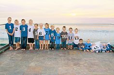 a group of young boys standing next to each other