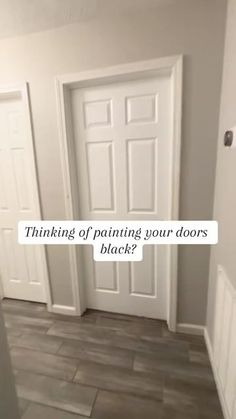 an empty room with three doors and the words thinking of painting your doors black?