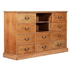 an old wooden dresser with many drawers