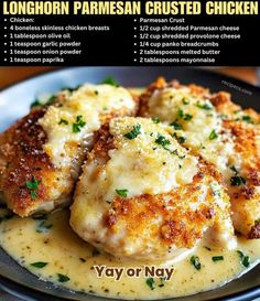 chicken parmesan crusted chicken is served on a plate with gravy