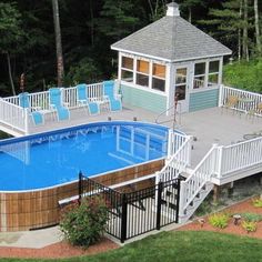 an above ground swimming pool with deck and gazebo