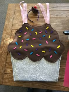 a bag made to look like a doughnut with sprinkles on it