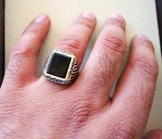 Rectangular silver aqeeq flat natural black onyx semi precious agate gemstone men ring sterling silver 925 jewelry all sizes fast shipping Risk free Quality guarantee policy : If you are not satisfied with your item for any reason simply send it to us and you will get a replacement or refund . please write or choose your size with the order and we will size it for you . Our ring is handcrafted mostly with a few simple tools . but some methods are used in casting like lost wax method . sterling s Black Sterling Silver Rectangular Signet Ring, Silver Onyx Gemstone Signet Ring, Silver Onyx Signet Ring With Polished Finish, Ottoman Styling, Men Ring, Small Rings, Lost Wax, 925 Jewelry, Agate Gemstone