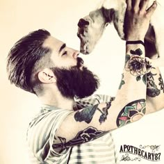 Chris John Millington and a puppy - full thick dark beard and mustache beards bearded man mens' style tattoos tattooed hairstyle hair undercut dogs dog handsome apothecary87 model #mansbestfriend #goodhair #beardsforever Chris John Millington, John Millington, Chris John, Tatto Boys, Beard Hairstyle, Beard Lover, Beard Trimmer