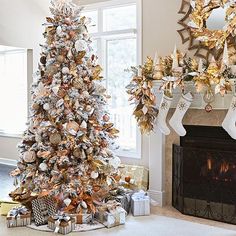 a christmas tree is decorated with gold and silver ornaments