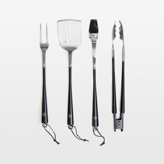 an assortment of kitchen utensils on a white background