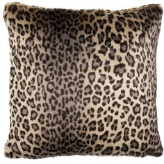 a leopard print pillow on a white background