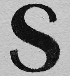 the letter s is written in black ink