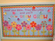 a child's bulletin board with flowers and butterflies on it that says read your bible, pray everyday and you'll grow growth