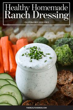 healthy homemade ranch dressing with cucumber, carrots and crackers on the side