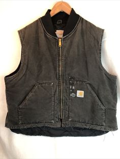 Faded and distressed. Some adhesive on front, holes in lining. Size 2XL best but please check measurements in photos. Please look at all photos closely as they are part of the detailed description. Feel free to ask any questions and thanks for looking! Carhartt Vest, Black Quilt, Vintage Shops, Look At, Mood Board, Street Wear, Feel Free, Band, Closet