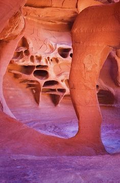 the interior of a rock formation with holes in it