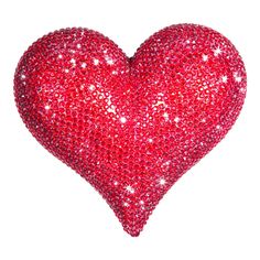 a large red heart shaped object with lots of small white stars on it's side