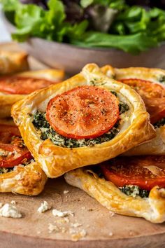 puff pastry with tomatoes and spinach on top