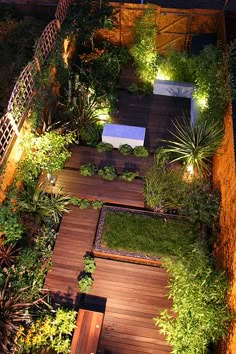 an aerial view of a garden at night