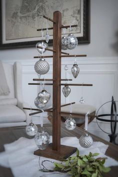 a christmas tree with ornaments hanging from it