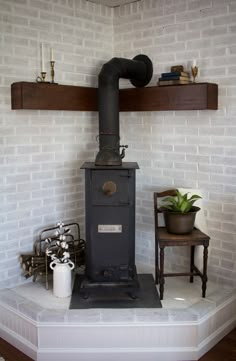 an old fashioned stove in the corner of a room