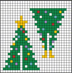 a cross stitch christmas tree is shown in green and yellow