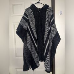 Llama Wool Handwoven Poncho Coat ~ Ecualama Brand ~ Handmade ~ Hood Attached ~ Made With Real Alpaca Llama Wool Yarn ~ Unisex ~ Weighs Around 900g ~ Adult Size (43" W X 38" H / 110 Cm W X 96 Cm) ~ Brand New; Never Worn ~ Extremely Warm & Soft Hand Wash Only, Mild Detergent, Do Not Use Bleach! Handwoven Poncho, Poncho Coat, Soft Hands, Soft Hand, Wool Yarn, Llama, Alpaca, Black And Grey, Bleach