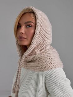 Beige Wool Balaclava Hat, Women Knit Balaclava, Knitted Women Hood, Winter Hat, Knit Hood, Neck Warmer, Trending Now, Outdoors Gift The trendy version of the headdress is a snood hood made of cozy warm wool blend yarn. The model of comfortable volume is combined with a collar that covers the base of the neck and replaces a scarf. The hood has a drawstring with a twisted cord to adjust the fit along the edge. Leave this scarf on after you take off your jacket, it will become a stylish addition to a pullover or sweater. A super soft and cozy hooded scarf. Product details: 70% acrylic, 20 % mohair, 10 %wool Width - 12 in Length - 20 in Cozy Knitted Beige Bonnet, Winter Knit Bonnet One Size, Winter Knit Bonnet, Beige Knitted Bonnet Beanie, Knitted One Size Bonnet For Cold Weather, Winter Crochet Hat With Knit Fabrication, Beige Yarn Crochet Hat For Winter, Beige Crochet Yarn Hat For Winter, Winter Beige Knit Bonnet