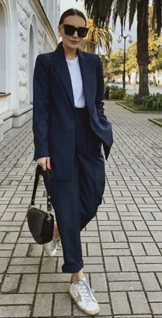 Women’s Suit With Sneakers, Summer Pantsuits For Women, Striped Suit Women Outfit, Casual Suit Outfits Women, Navy Pinstripe Suit Women, Women Pinstripe Suit, Tailored Womens Suits, Sneakers And Blazer Outfits Women, Striped Suit Women