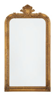 an ornate gold framed mirror against a white background