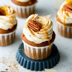 cupcakes with frosting and caramel drizzle on top