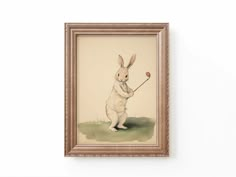 a painting of a rabbit holding a golf club