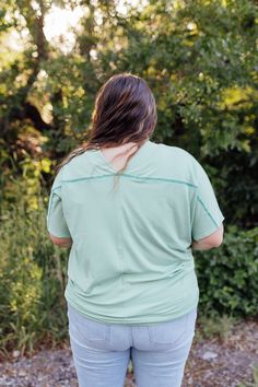 *ALL SALES FINAL* *NOT ELIGIBLE FOR RETURN* Introducing the Catherine Top! With a fresh mint green color and ribbed texture, this top is both oversized stylish and comfortable. The wide v-neck front and back add a touch of elegance, while the drop shoulder short sleeves keep it relaxed. Perfect for any occasion. Fits true to size. Model is wearing a small and is 5'6". Plus model is wearing a 1X and is 5'7". Size Chart Length Bust S 27" 58" M 28" 60" L 29.5" 62" XL 31.5" 64" 2x 31.5" 67" 3x 31.5" Oversized Green V-neck Top, Green Relaxed Fit V-neck Top, Green Relaxed Fit V-neck Top Casual, Casual Green V-neck Top With Relaxed Fit, Green V-neck Casual Top, Casual Green V-neck Top, Green V-neck Top For Everyday, Tiered Dresses, Plus Model