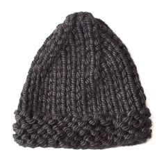 a knitted beanie is shown on a white background