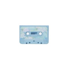 a blue and white cassette with flowers on the side, in front of a white background