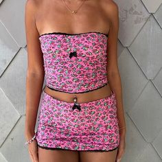 💋 floral summer matching set 💋 deadstock pink floral bikini fabric 💋 matching 2 piece pink set 💋 handmade by me 💋 black lace detailing + cute black bow please allow 1 week for shipping as all orders are handmade 🎀 very stretchy!! wearing size S S - 32" bust & 24-25" waist M - 34" bust & 26"-27" waist L - 36" bust & 28-29" waist Fitted Pink Y2k Crop Top, Pink Fitted Y2k Crop Top, Fitted Y2k Pink Crop Top, Pink Two-piece Casual Tops, Pink Casual Two-piece Top, Casual Pink Two-piece Top, Pink Matching Set Beach Tops, Summer Two-piece Pink Crop Top, Pink Matching Set Tops For Beach