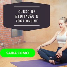 a woman is sitting on a yoga mat and meditating