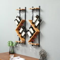 two wooden shelves holding wine glasses and bottles