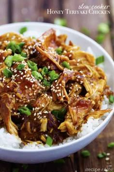 a white bowl filled with meat and rice