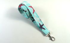 This cute lanyard has beautiful colorful starfishes on turquoise design, very beautiful in person. This lanyard is very beautiful in person. You can have a wardrobe of lanyard to match your outfit. This lanyard is made of soft 100% cotton fabric to give a comfortable feel around your neck. This lanyard is easy to take care. You can spot clean and throw in a washer and hang dry. If you want you can iron and it is ready to use. These lanyards are perfect if you have metal allergy. Each of these la Cute Lanyard, Turquoise Design, Cute Lanyards, Patriotic Fabric, Fabric Lanyard, Have Metal, Hanging Dryer, Badge Holder, Badge Holders Lanyard