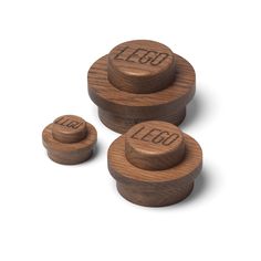 three wooden knobs with the word leo on them