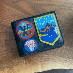 Limited Edition Louis Vuitton Patches Wallet. Used - In Good Condition Wear And Tear Shown Along Edge Where Red Detailing Is. Some Peeled Off - Otherwise Good Condition! Limited Edition Louis Vuitton, Louis Vuitton Limited Edition, Limited Editions, Black Gray, Black And Grey, Limited Edition, Louis Vuitton, Wallet, Red