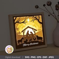 a christmas nativity scene with the birth of jesus and baby jesus is shown in this paper cutout