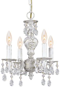 a chandelier with crystal drops hanging from it's sides and four lights on each side