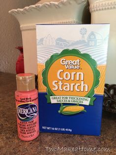 the ingredients to make corn starch are displayed in front of a box on a counter