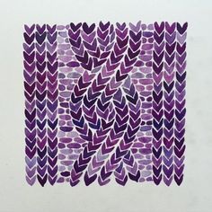 a drawing of purple leaves on white paper