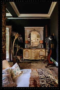 a living room filled with furniture and decor