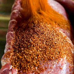 the meat is covered with spices and seasoning