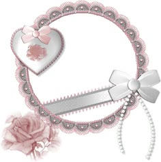 a pink and white heart shaped object with a ribbon around it